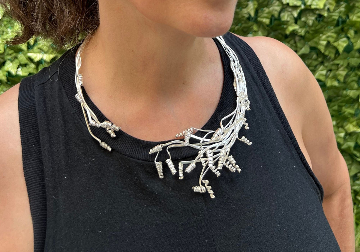 Suzanne Schwartz Necklaces — multi-strand Argentium silver wire fringe necklace, worn outdoors