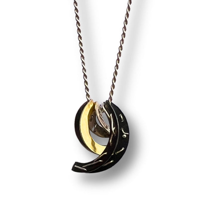 Necklace with a unique pendant on a white background