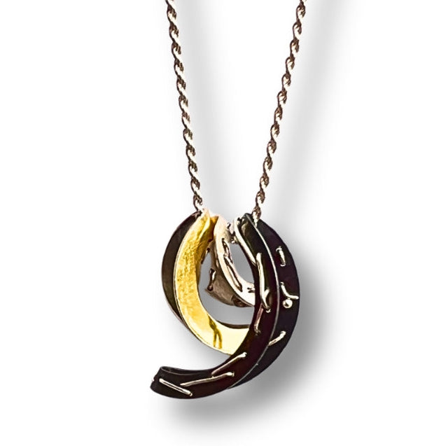 Necklace with a unique pendant on a white background