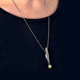 Suzanne Schwartz Wearing Drop Pearl Necklace with 22k Fused Gold and Tahitian Pearl