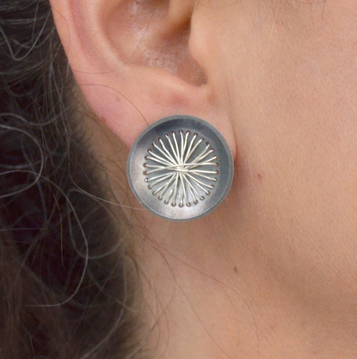 Suzanne Schwartz wearing Circle Sewn Earring